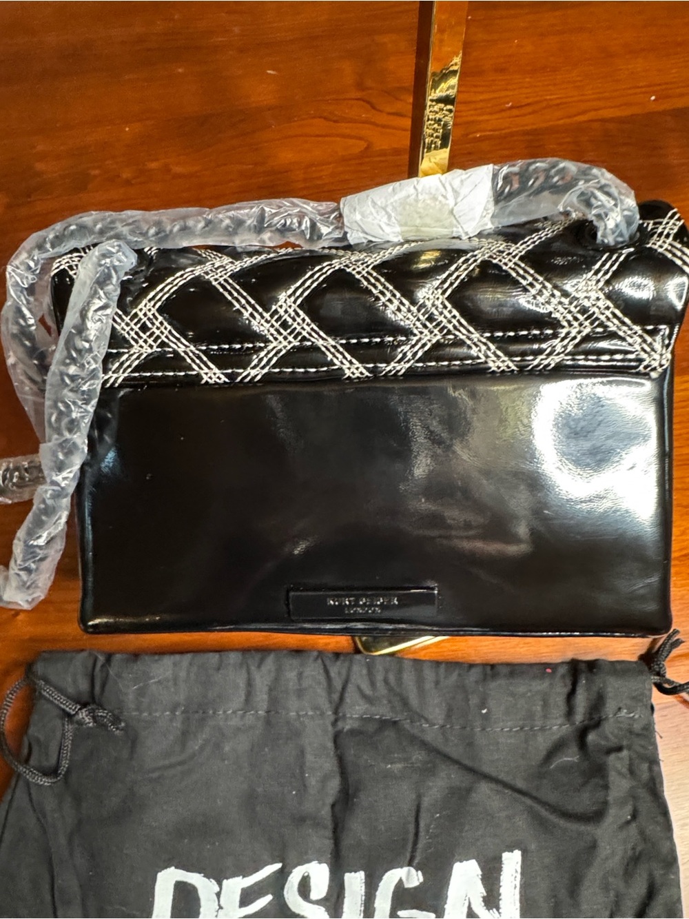 NWT Kurt Geiger Mini Kensington Drench Black Patent White Stitch - Picture 2 of 4